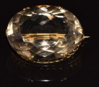 A 9ct gold brooch set with a large oval cut citrine, 17.1g