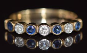 A 9ct gold half eternity ring set with sapphires and diamonds, 1.8g, size M