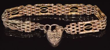 A 9ct rose gold gate bracelet with heart padlock clasp, 7.4g