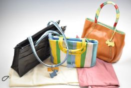 Three Radley handbags with multicoloured handles and decoration, all with dust bags