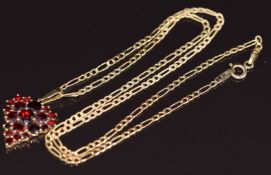 A 9ct gold pendant in the form of a bunch of grapes set with garnets, on 9ct gold chain, 3g