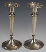 Pair of American silver candlesticks, marked to bases Shreve & Co. San Francisco sterling base