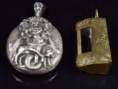 Indian silver locket with embossed locket depicting a lady and cow together with a Chinese lock