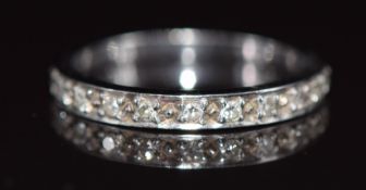 An 18ct white gold half eternity ring set with diamonds, 2g, size J