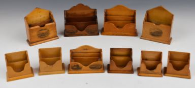 Collection of Mauchline ware letter / stationery racks for Pitnocree, Llandudno, Crystal Palace,
