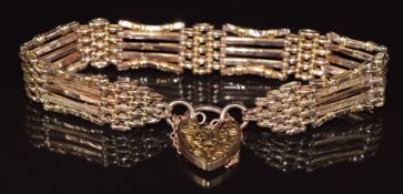 A 9ct rose gold bracelet with heart padlock clasp, 8.7g