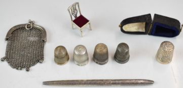 Five hallmarked silver thimbles including a Charles Horner example in Hanry Tainsh of Cardiff
