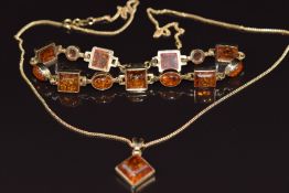 A 9ct gold bracelet set with square and oval pressed amber cabochons and matching pendant, 15.8g