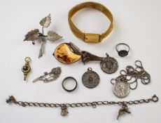 A silver brooch set with amber, silver St Christopher, silver and marcasite ring, silver charm