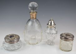 Hallmarked silver mounted glass items comprising decanter, sugar sifter and two dressing table pots,