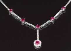 A 14k white gold necklace set with rubies and diamonds, 6.5g