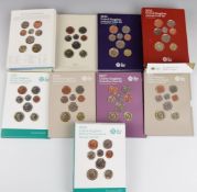 Run of nine Royal Mint UK definitive or annual coin sets 2014-2022, all in original packaging,