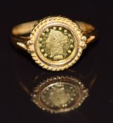 A 22ct gold ring set with miniature gold coin, 2.8g, size K