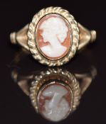 A 9ct gold ring set with a cameo depicting a young woman, 4.8g, size O