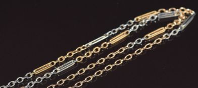 An 18ct gold bi-coloured necklace made up of oval and elongated links, 8.2g