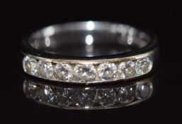 An 18ct white gold ring set with five diamonds totalling approximately 0.5ct, 3.4g, size J/K