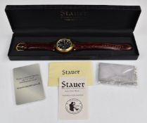 Stauer gentleman's automatic triple calendar wristwatch with moonphase, date aperture, day, date and