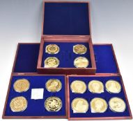 Three cased sets of 'oversized' specimen medallion coins, comprising fourteen cupronickel coins
