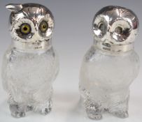 Pair of German novelty silver lidded owl peppers with glass bodies, marked to rims Germany