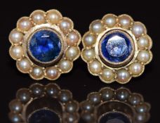 A pair of 9ct gold earrings each set with a round cut sapphire surrounded by pearls, 2g 0.9cm