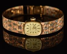 Marvin 9ct gold ladies wristwatch with black hands, two-tone hour markers, gold dial and 17 jewel