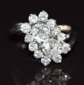 Art Deco irid/ platinum ring set with two old cut diamonds, each approximately 0.65ct, surrounded by