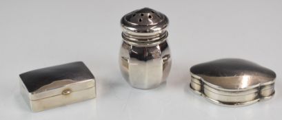 Two modern hallmarked silver pill boxes, length of longer 3.5cm, together with a miniature pepper