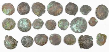 Twenty small bronze Roman coins labelled as 'Found on Roman Army site at Heybridge Basin, Maldon,