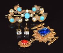 A yellow metal brooch in the form of a bow set with turquoise and paste, a yellow metal pendant