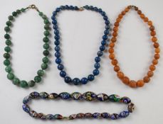 Four necklaces comprising beaded amber, aventurine quartz, sodalite and millefiori glass