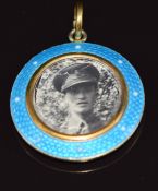 A c1915 silver gilt locket set with guilloché enamel