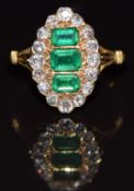 Victorian 18ct gold ring set with three apple green emerald cut emeralds surrounded by old cut