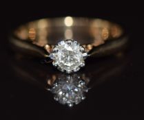 A 9ct gold ring set with a round cut diamond of approximately 0.23ct, 2.5g, size M