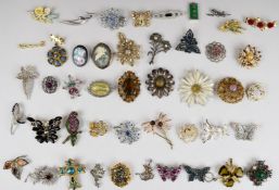 A collection of vintage brooches including marcasite, A & S, Jacobite, Sarah Coventry, silver set