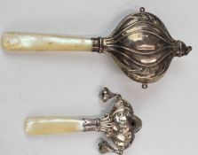 Two hallmarked silver mother of pearl handled baby's rattles, Chester 1920, maker Adie & Lovekin