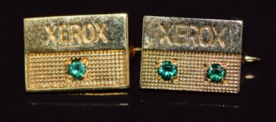 A pair of 9ct gold Xerox badges, 2.9g