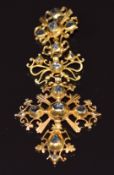 A 19thC yellow metal brooch set with foiled diamonds, 10.7g 6.5x3cm