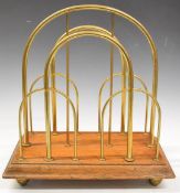 19th or early 20thC oak and brass magazine or newspaper rack, with WT & S maker's mark to base,
