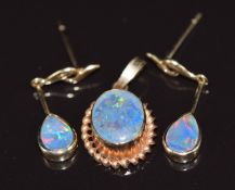 A 9ct gold pendant set with an opal triplet, with similar earrings, 2.3g