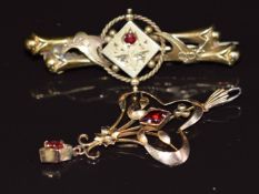 Edwardian 9ct gold pendant and an Edwardian 9ct gold brooch set with a ruby and diamonds, Birmingham
