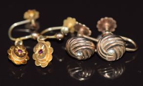 Two pairs of 9ct gold earrings, one pair set with a ruby in a star setting, 2.9g