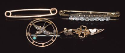 Three 9ct gold brooches and an Edwardian 9ct gold brooch in the form of a swallow set with seed