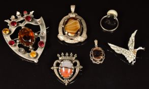 A large silver brooch set with paste, Miracle pendant and brooch, silver ring set with a pearl,