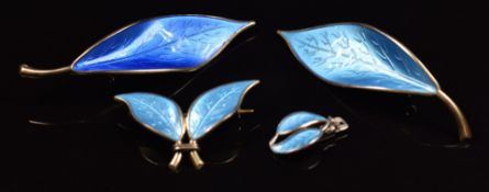 Three David Andersen Norwegian silver brooches set with enamel
