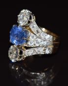 An 18ct gold ring set with an oval cut cornflower blue Ceylon sapphire measuring 4.17ct, certified