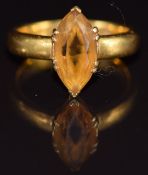 A 22ct gold ring set with a marquise cut citrine, London 1928, 8.6g, size R