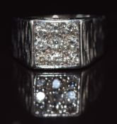 An 18ct white gold ring set with six diamonds in a square setting, the total diamond weight