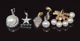 A 14k white gold pendant set with a pearl and diamonds (1.5g), a 9ct gold pendant set with diamonds,