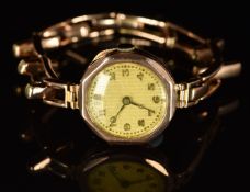 Unnamed 9ct gold ladies wristwatch with blued hands, gold Arabic numerals, gold dial and