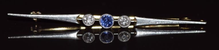 Art Deco 18ct gold brooch set with a purple / blue sapphire of approximately 0.2ct and two